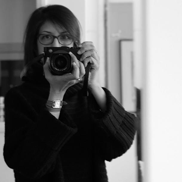 photo of Darshana Shilpi Rouget taking a photo of herself in the mirror