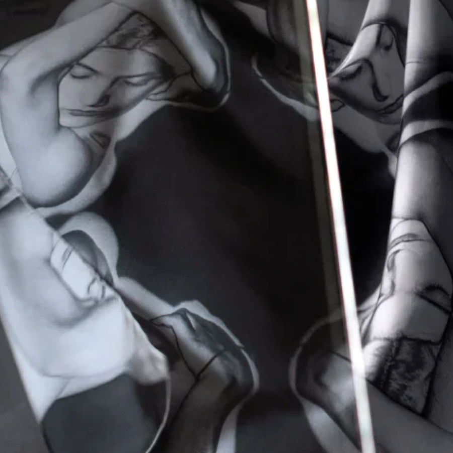 An image of a photo by Man Ray on a large scarf - an abstract woman in black and white