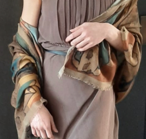 torso of person wearing the sacred stance scarf demonstrating draping