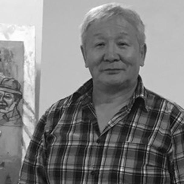 photo of artist Shagdarjavin Chimeddorj standing in his studio