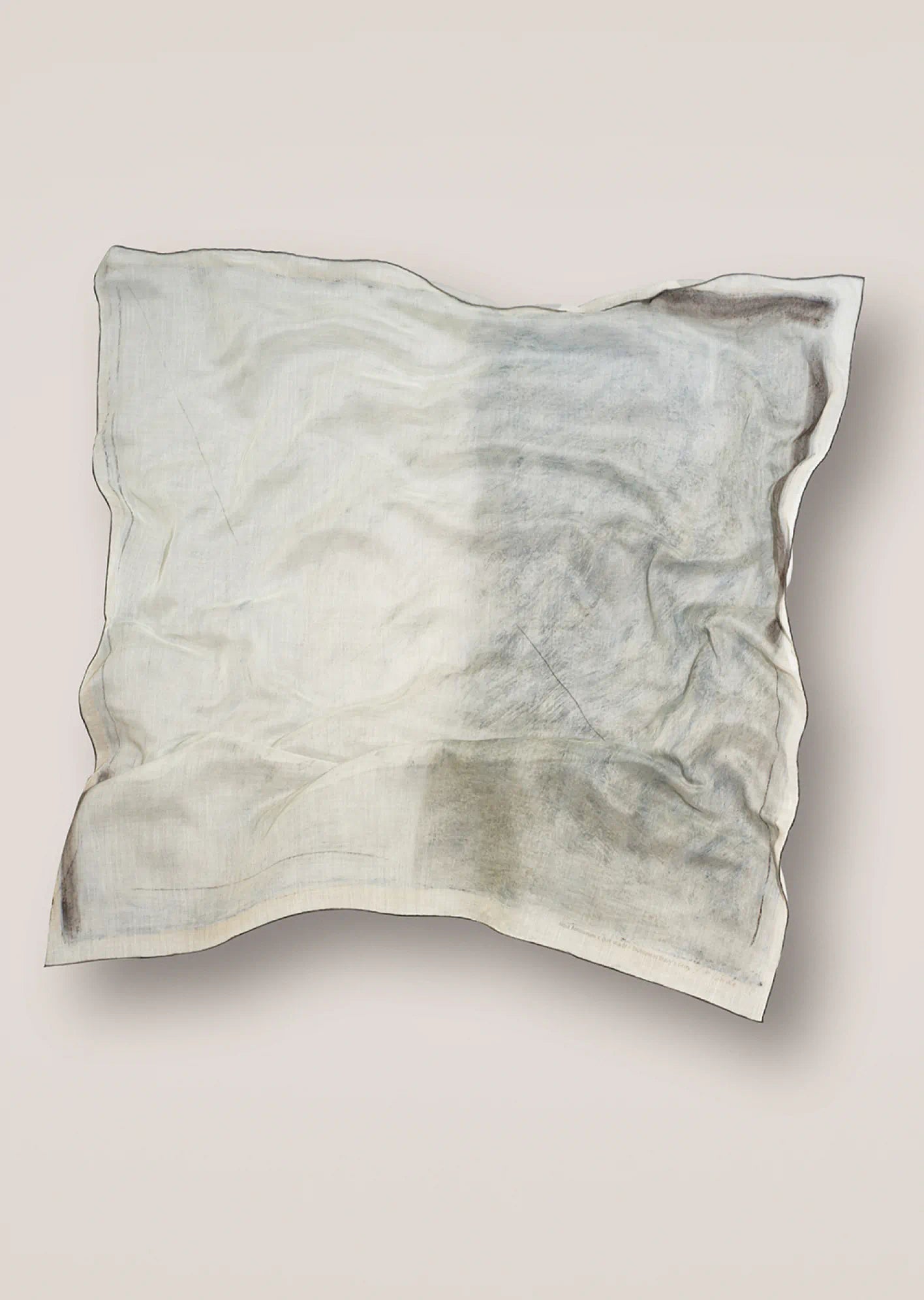 Dot Wade abstract scarf in grey tones on a beige background