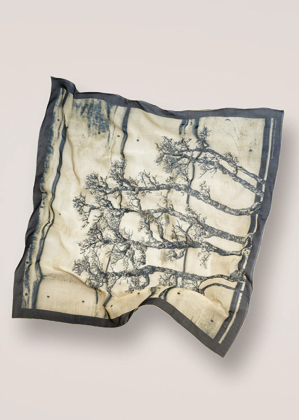 James T Murray scarf with tree pattern on a beige background