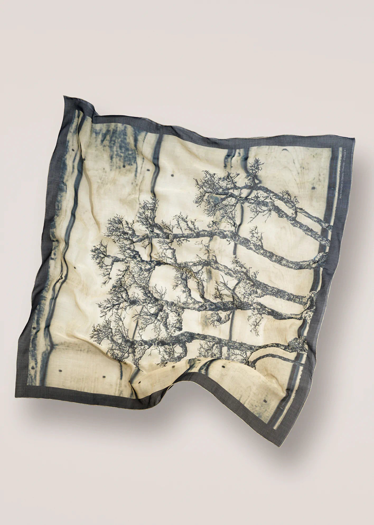 James T Murray scarf with tree pattern on a beige background