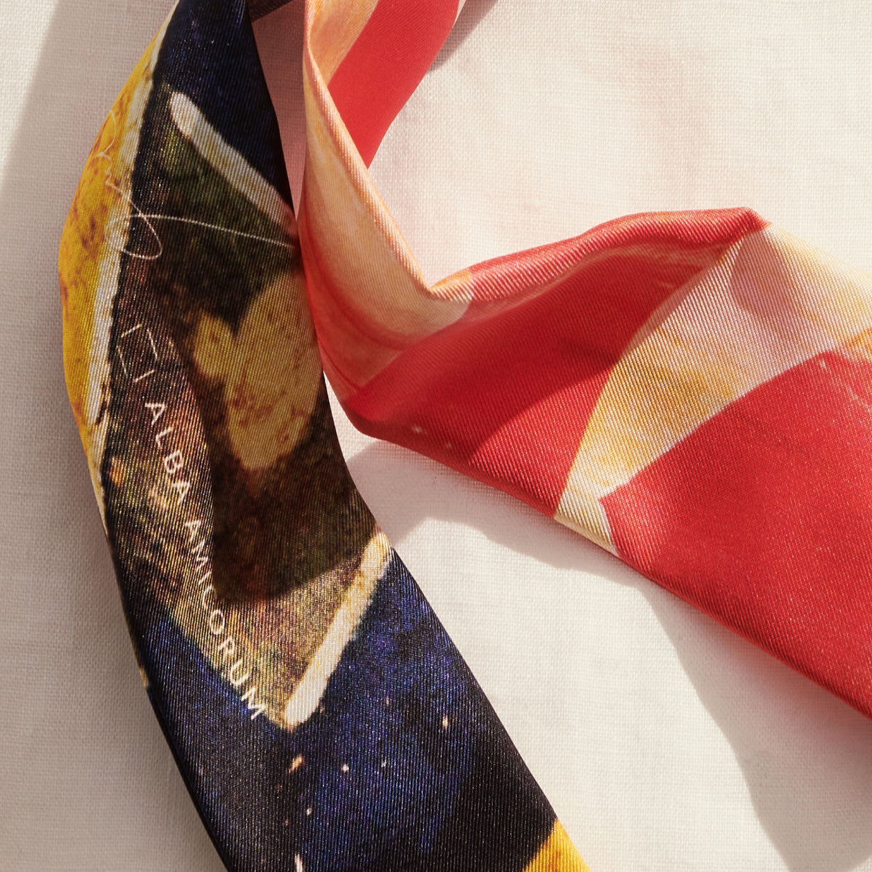 A romantic yet edgy vibe of the 90s Soho, NYC by James T Murray in this silk twilly scarf
