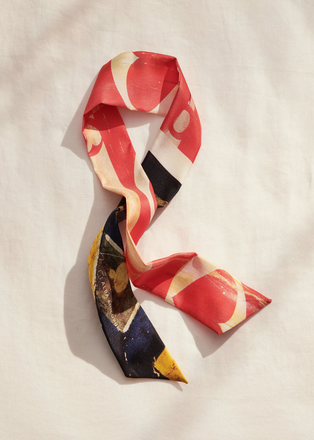 A romantic yet edgy vibe of the 90s Soho, NYC by James T Murray in this silk twilly scarf